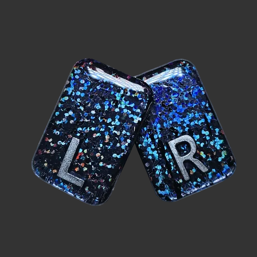 Holographic black Glitter x ray markers for radiographers and x ray techs made by x ray vision uk