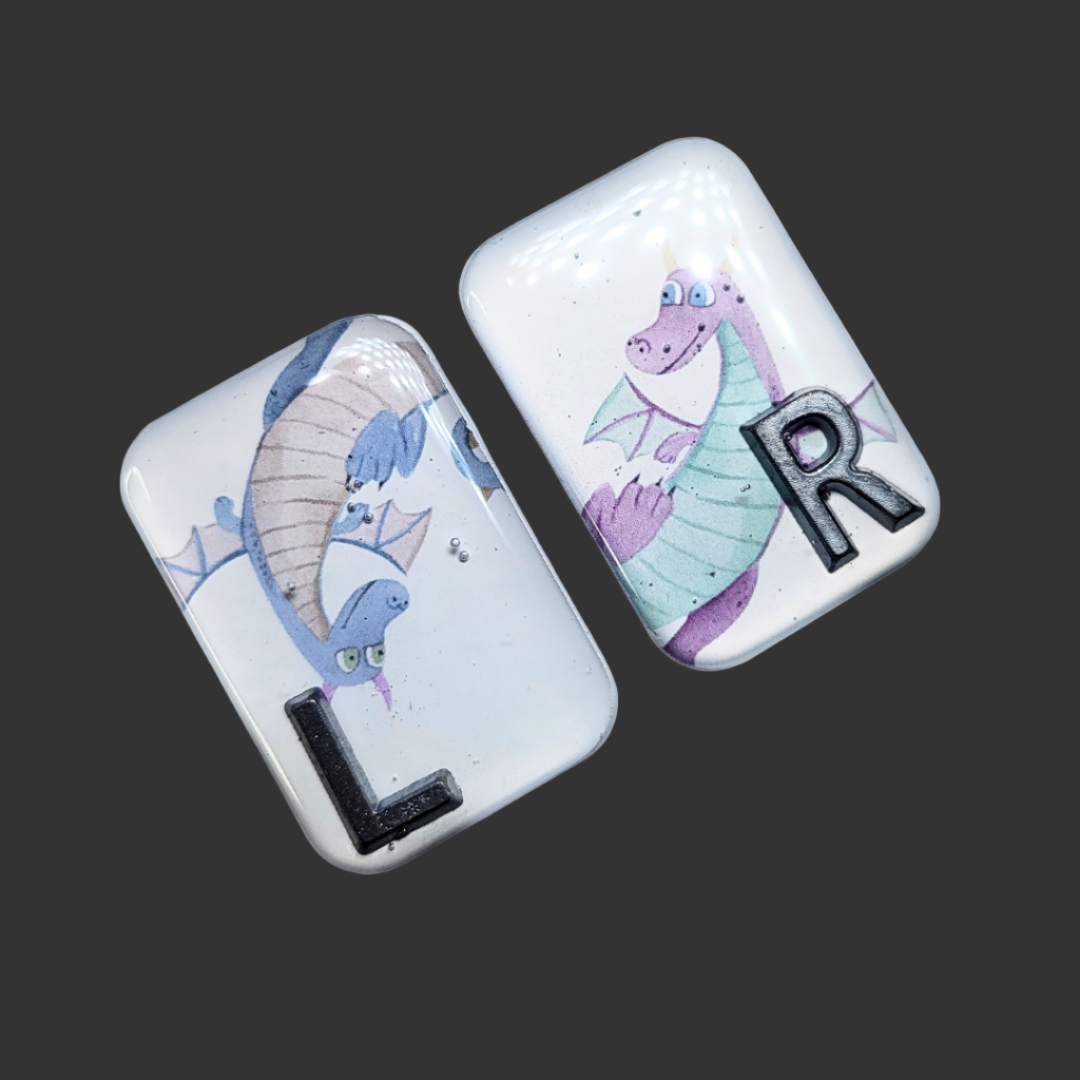 Handmade dragon X-ray markers for radiographers, customisable with initials or numbers