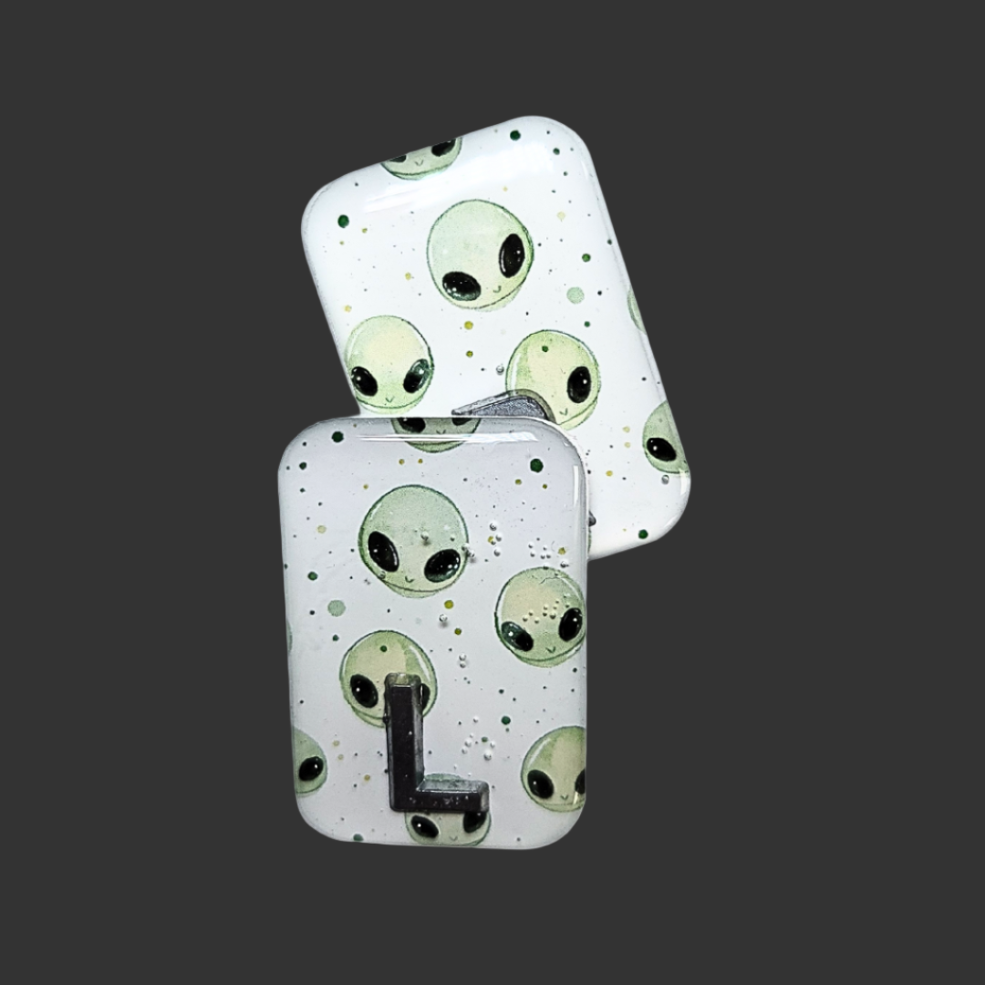 Handmade alien X-ray markers for radiographers, customisable with initials or numbers
