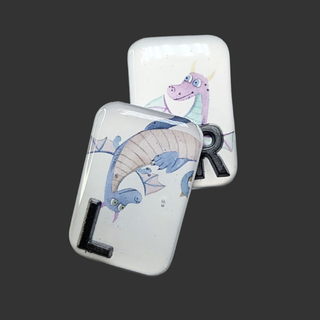 Handmade dragon X-ray markers for radiographers, customisable with initials or numbers