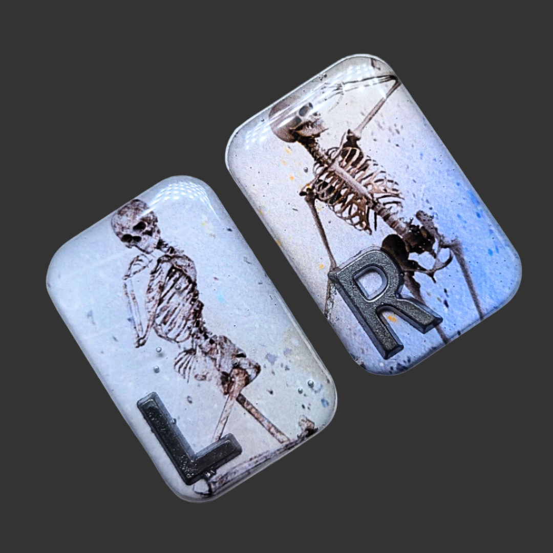 Blue and light blue X-ray marker set with two cheeky skeleton designs