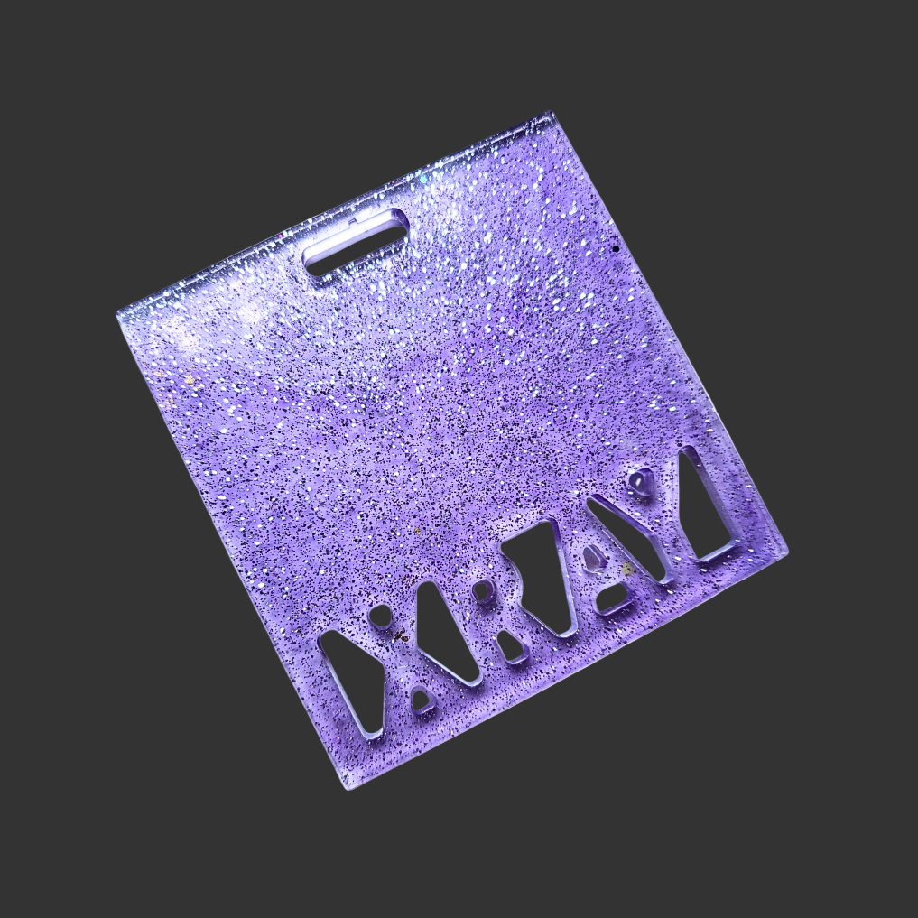 Badge buddy in assorted colours designed to hold X-ray markers. for radiographers and x ray techs