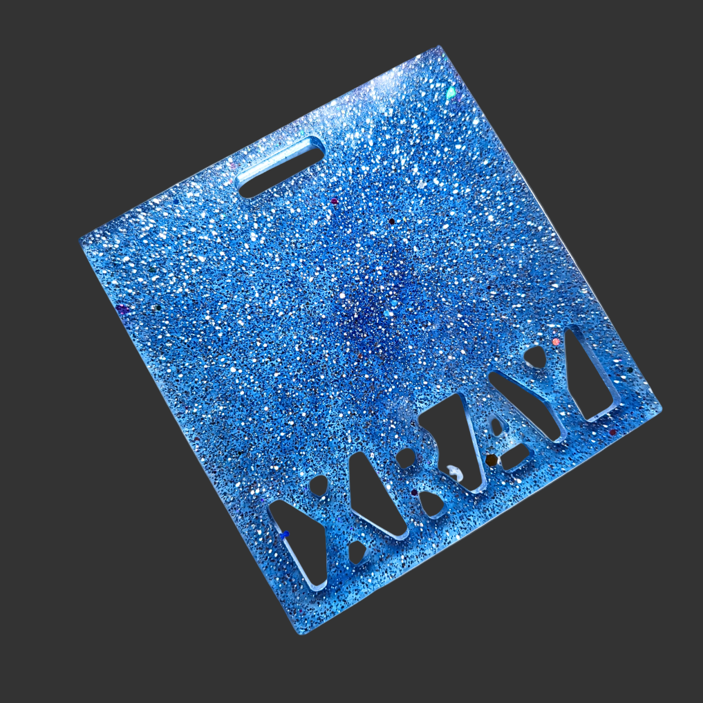 Badge buddy in assorted colours designed to hold X-ray markers. for radiographers and x ray techs