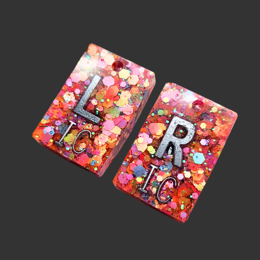 Orange polka glitter X-ray marker set with chain and personalisable initials or numbers.