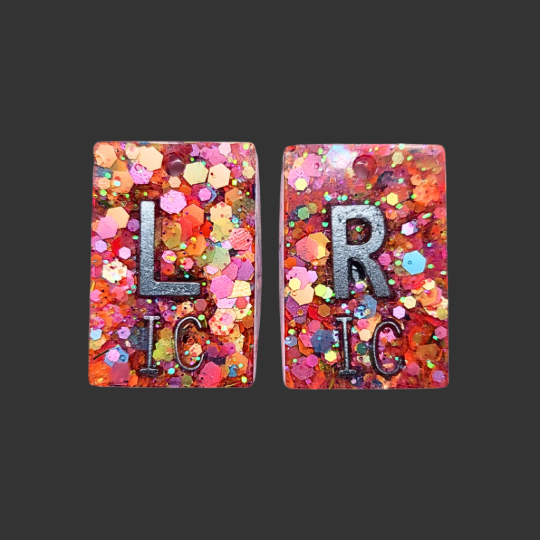Orange polka glitter X-ray marker set with chain and personalisable initials or numbers.