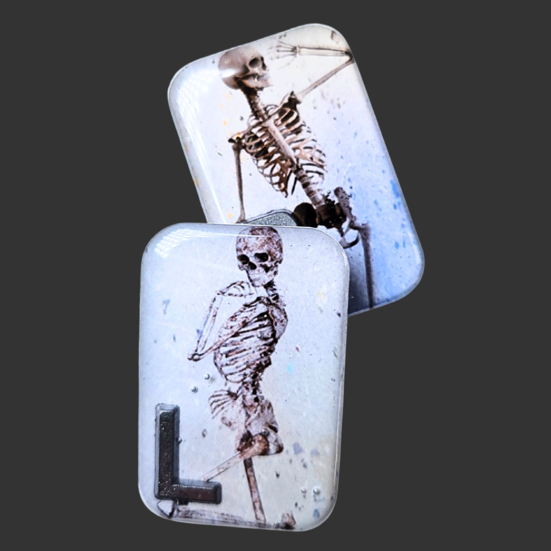 Blue and light blue X-ray marker set with two cheeky skeleton designs