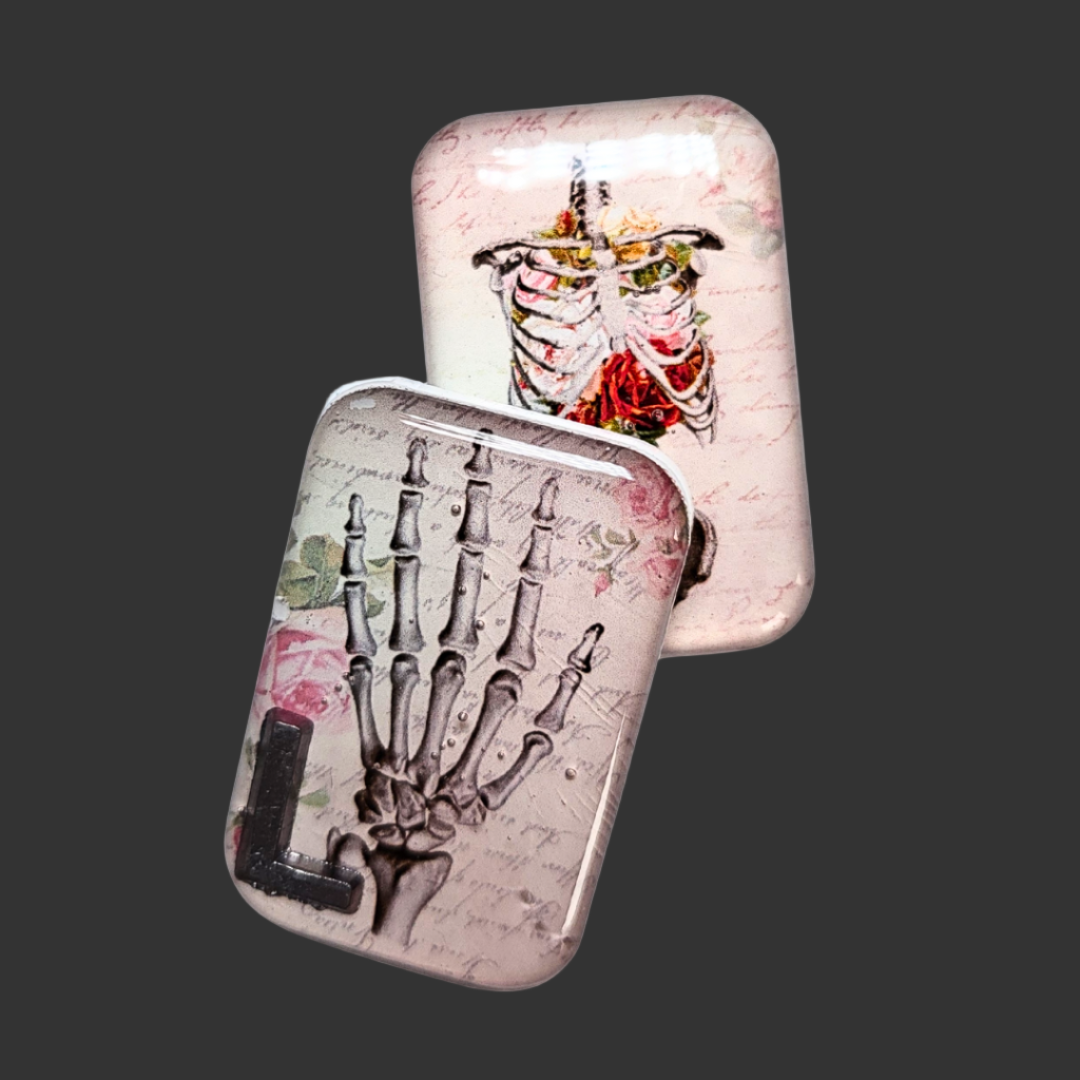 Acrylic X-ray markers with hand anatomy, abdomen, and pelvis illustrations, personalised for radiographers