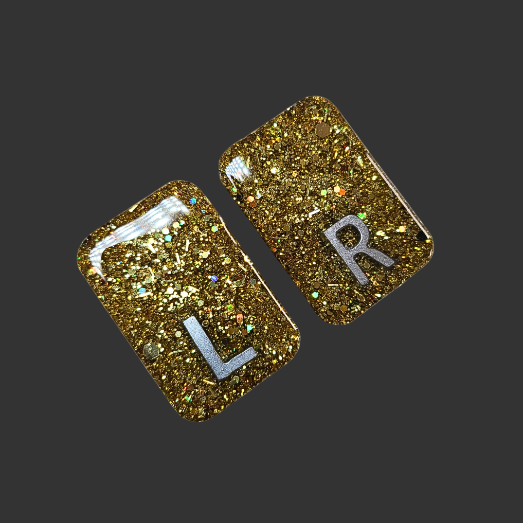 gold chunky glitter X-ray markers with custom initials option. x ray markers for radiographers and x ray techs