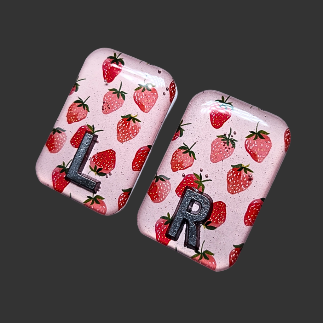 Strawberry-themed X-ray markers in red and green, fun and functional for radiographers and X-ray techs.