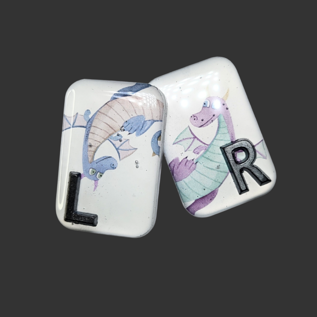 Handmade dragon X-ray markers for radiographers, customisable with initials or numbers