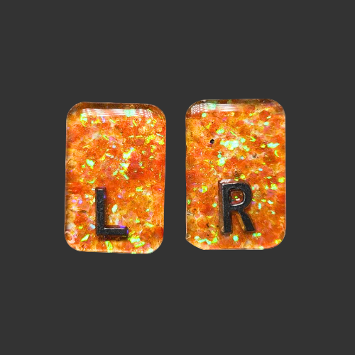X Ray markers orange glitter Made by X-ray vision uk for radiographers and X-ray techs