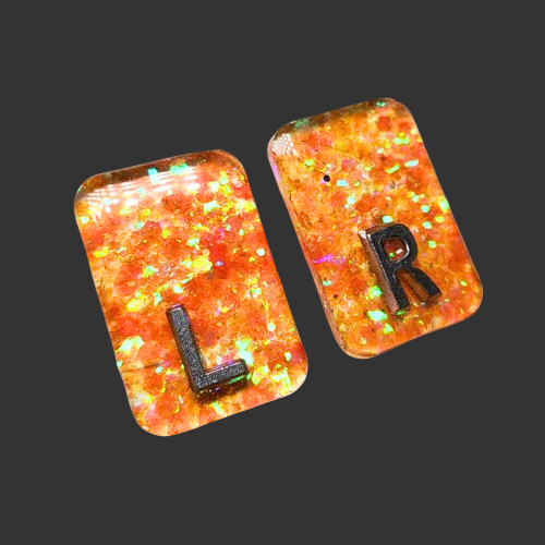 X Ray markers orange glitter Made by X-ray vision uk for radiographers and X-ray techs