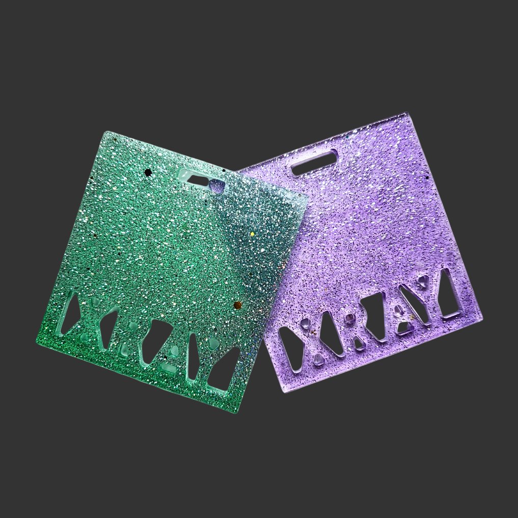 Badge buddy in assorted colours designed to hold X-ray markers. for radiographers and x ray techs