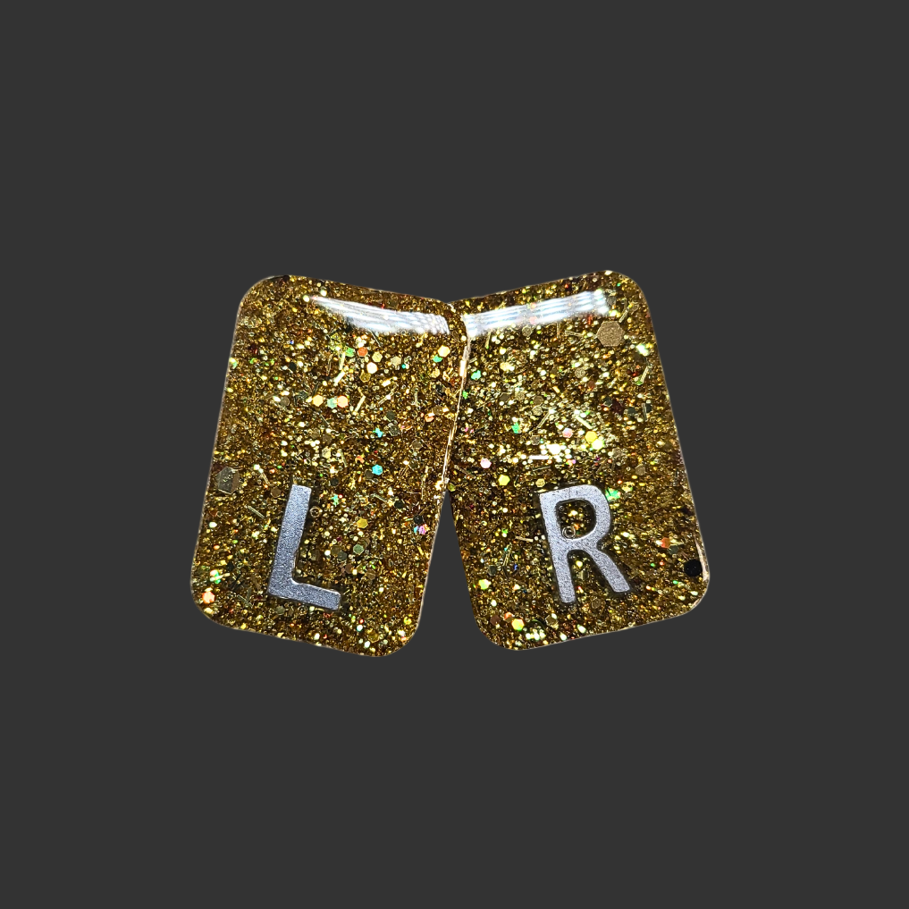 gold chunky glitter X-ray markers with custom initials option. x ray markers for radiographers and x ray techs