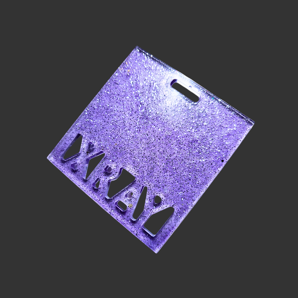 Badge buddy in assorted colours designed to hold X-ray markers. for radiographers and x ray techs