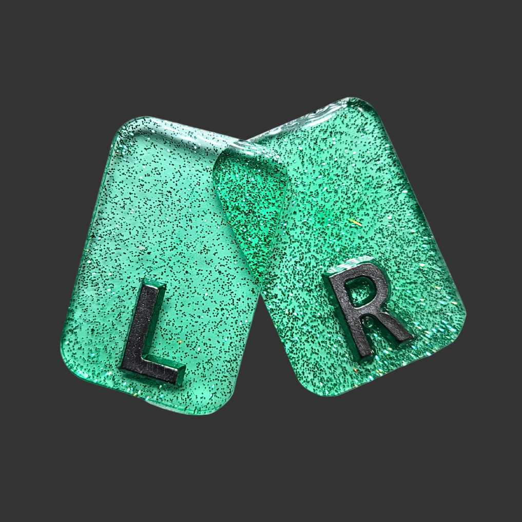 Set of green see-through markers with silver glitter inside for radiographers and x ray techs