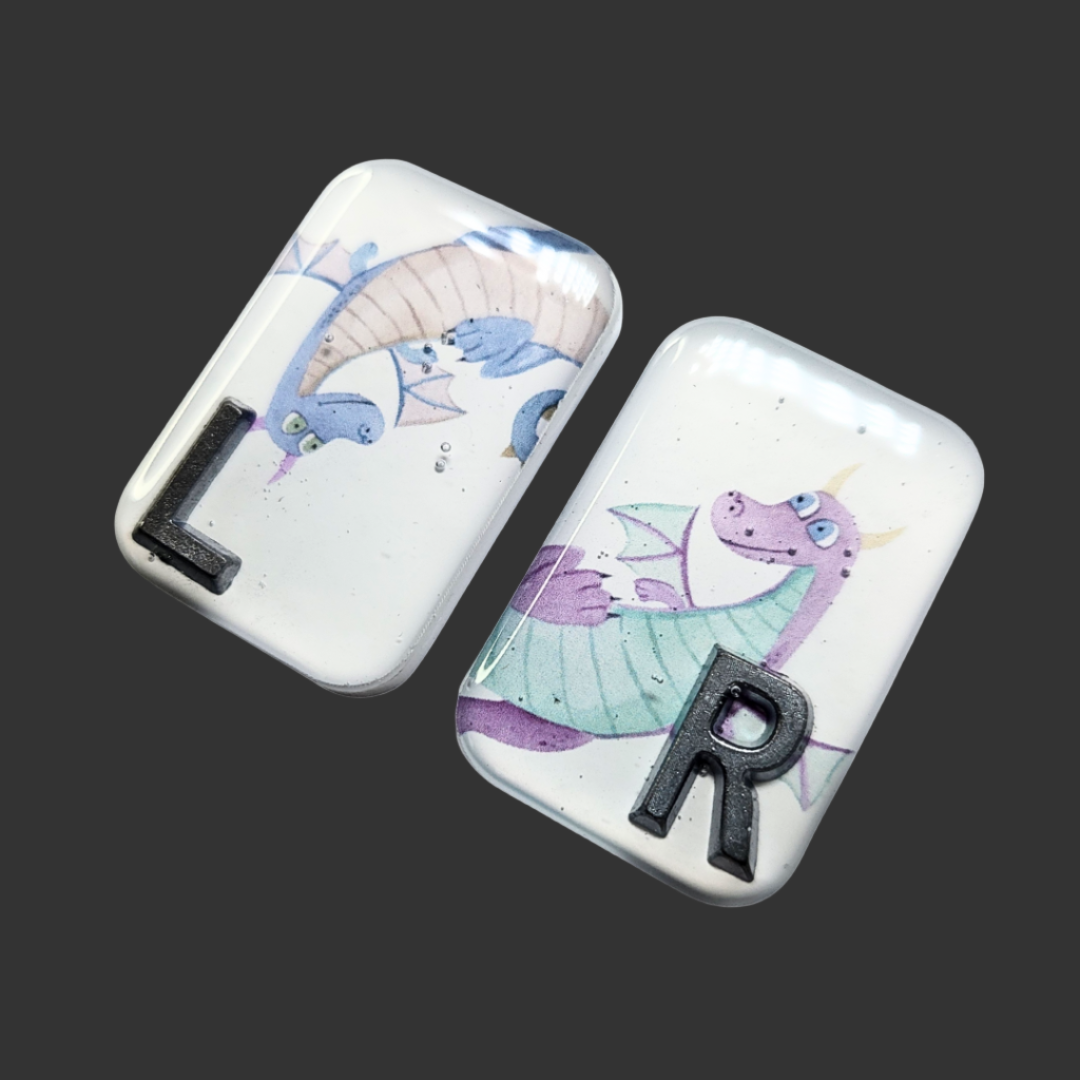 Handmade dragon X-ray markers for radiographers, customisable with initials or numbers