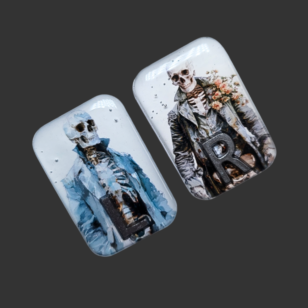 Retro skeleton-themed X-ray markers wearing coats, unique and fun design for radiographers and X-ray techs