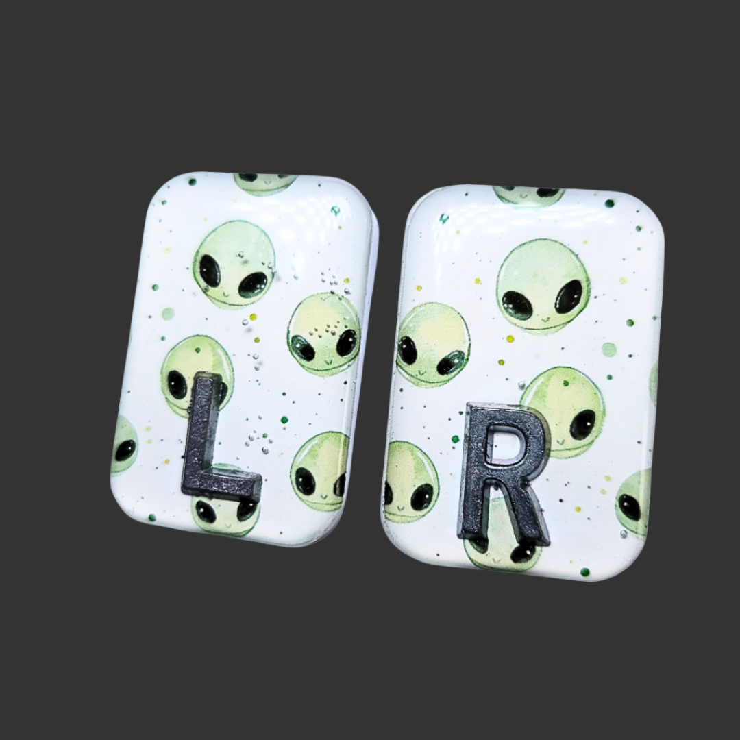 Handmade alien X-ray markers for radiographers, customisable with initials or numbers