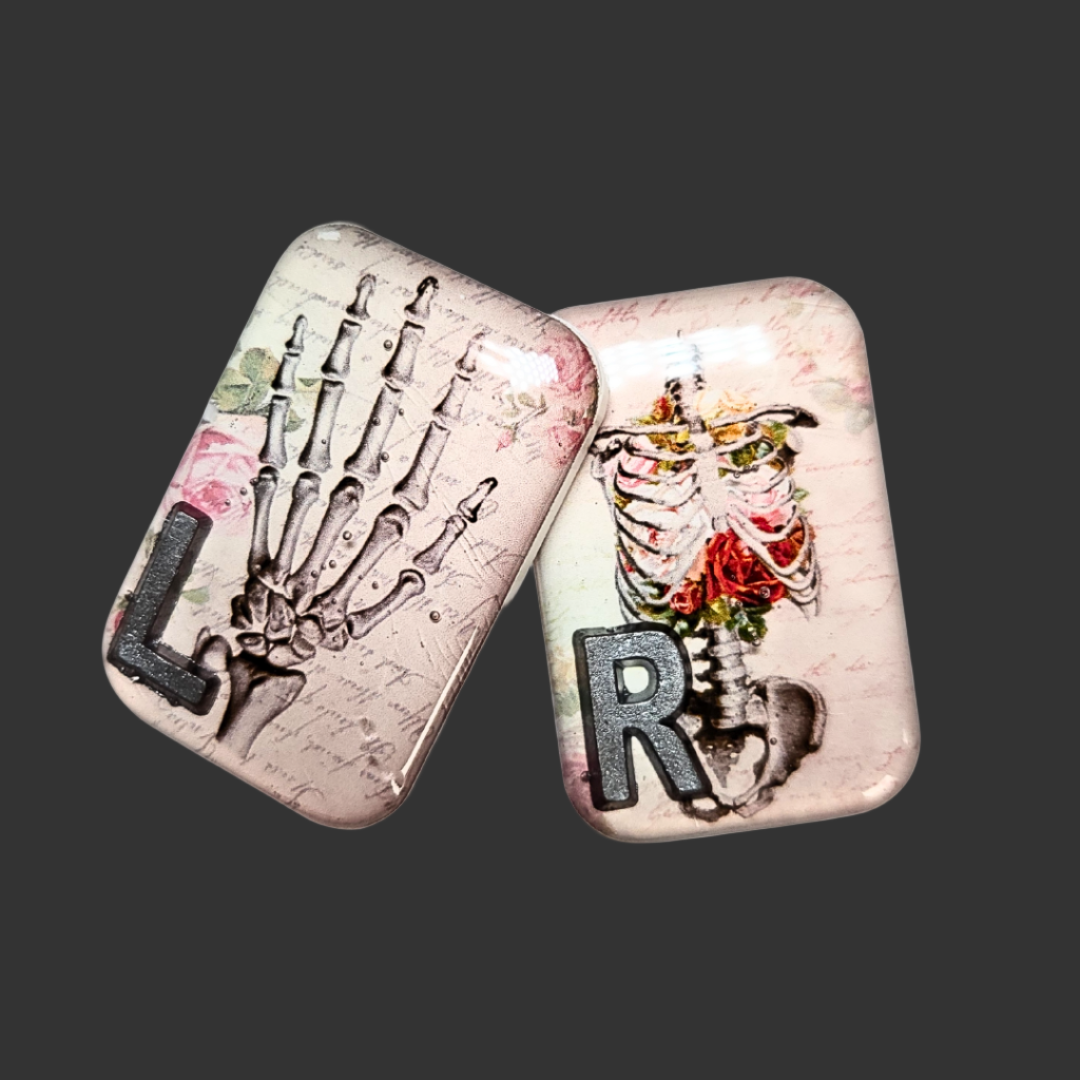 Acrylic X-ray markers with hand anatomy, abdomen, and pelvis illustrations, personalised for radiographers